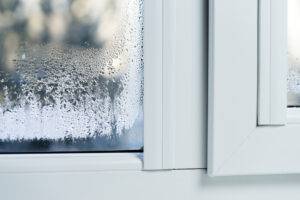 Double glazed pvc window with condensation on the pane