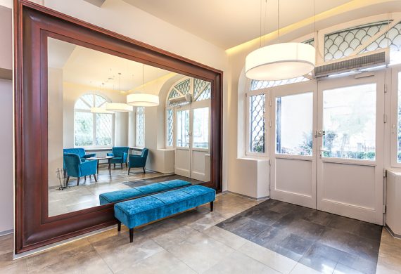 A large mirror in a home showcasing a tidy home