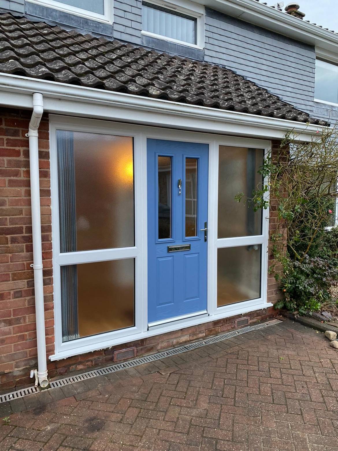 aaa upvc entrance after with new composite door and side screens